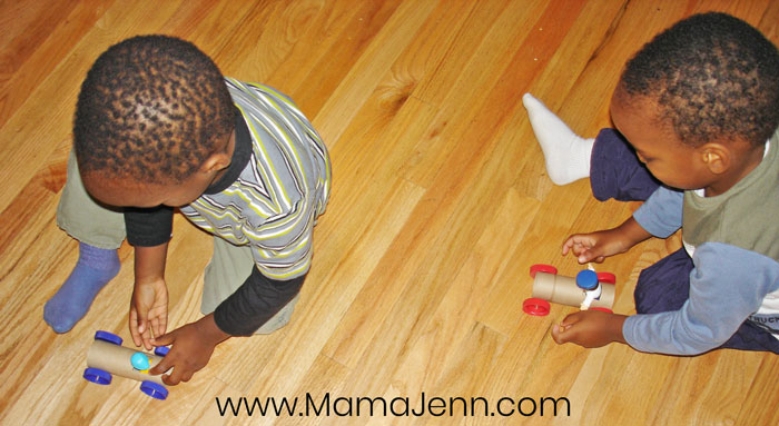 boys playing with TP Tube Race Cars