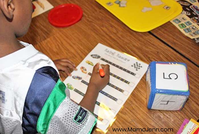 boy playing the Racing Racecars game